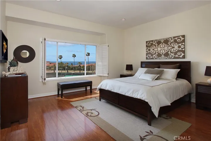Ocean breezes and terrific ocean views from master bedroom overlooking Tennis Club which is adjacent to Tennis Villas. (PHOTOS FROM PRIOR STAGING, SHUTTERS REMOVED HOME PAINTED BUT VIEW IS THE SAME)