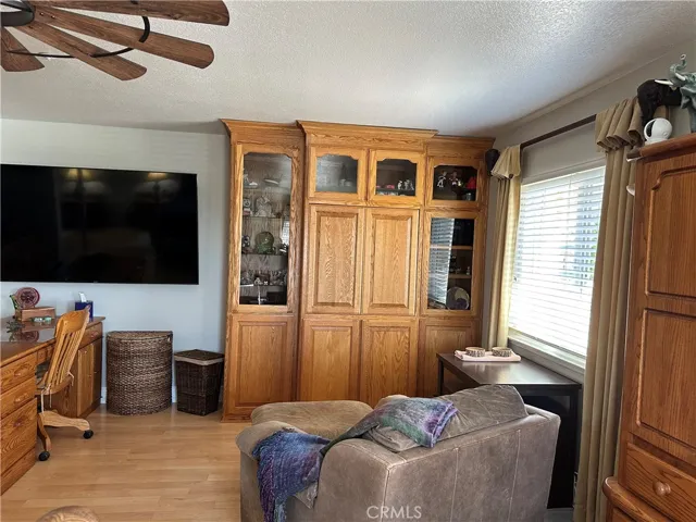  view of sitting area  and built in cabinet
