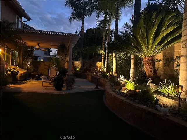 evening lighting planters backyard