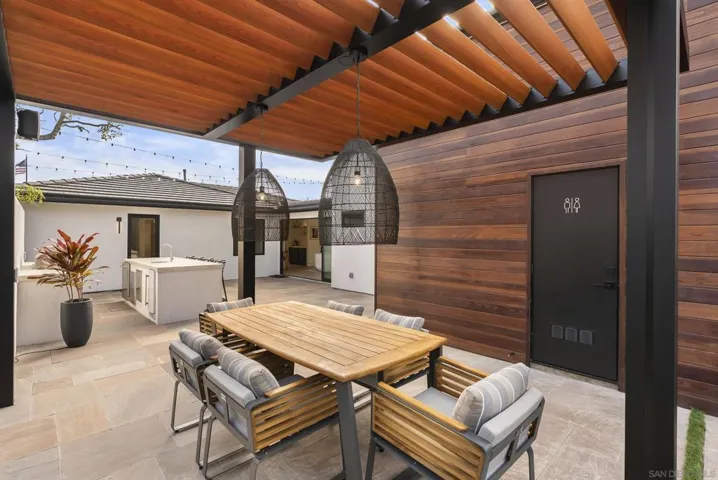 Outdoor dining table for coastal gatherings.