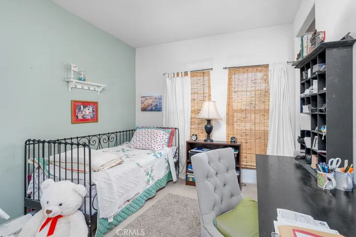 Bedroom #2 provides a private and serene space, with plenty of natural lighting