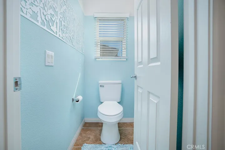 The master bath includes a separate toilet closet for enhanced comfort and privacy.
