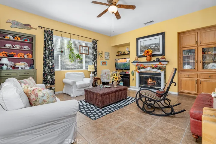 “Family room features built-in cabinetry for added storage.”