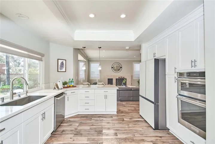 Kitchen with One piece Stainless Sink, Oven, Micro-wave Oven, Recessed Lights