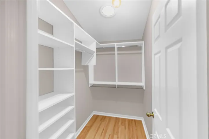 Walk in closet with built in organizer