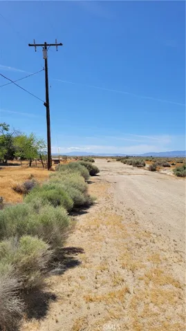 POWER LINES FACING WEST OF VACANT LOT