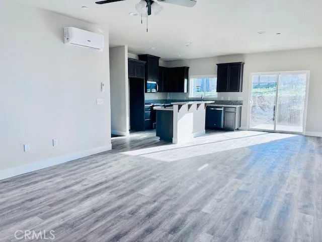 Family room looking into kitchen and dining area