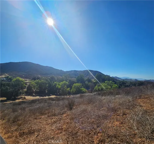 View From The Top Of The Hill At The Edge Of One Of The Lots.  ( There Seems To Be Some Stakes Around These Lots. Buyer To Verify If They Surround Both Lots )