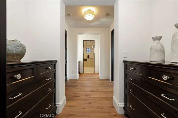 Two Primary closets with built-ins