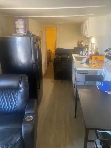 Long hall way from living room area to rear of the home.