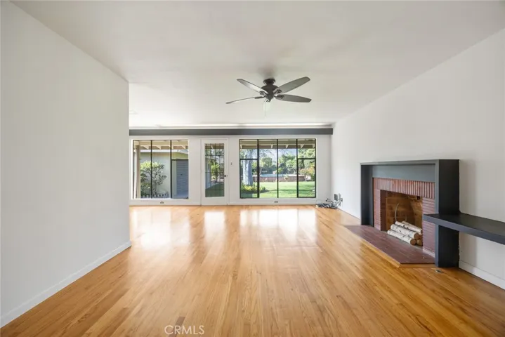 The spacious living room at 10357 Lesterford Drive has a gas burning fireplace in the living room.