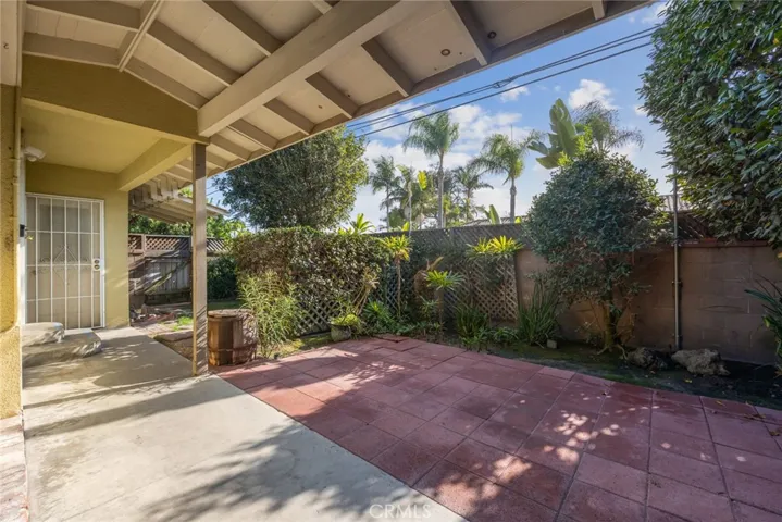 The quaint side yard and covered walkway at 10357 Lesterford Avenue