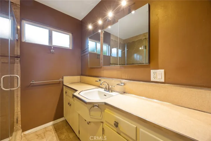 Updated while still remaining some of it's original charm is a good way to describe the bathroom at 10357 Lesterford Avenue