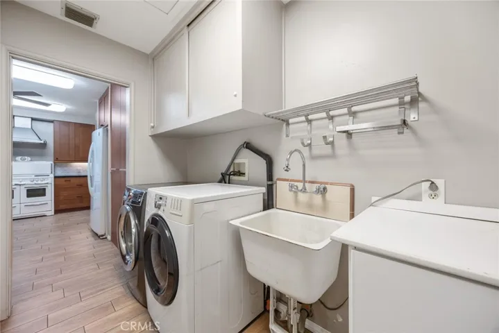 The indoor laundry area at 10357 Lesterford Avenue