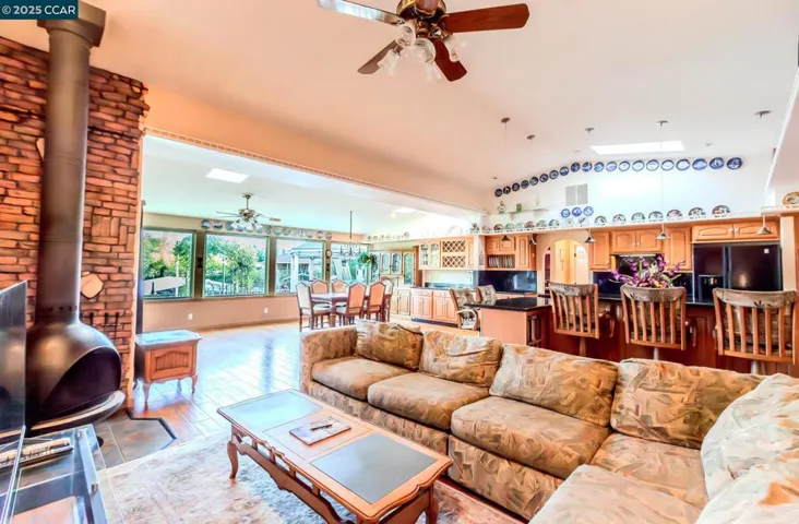 Great Room includes Family Room and Dining area with custom cabinets.