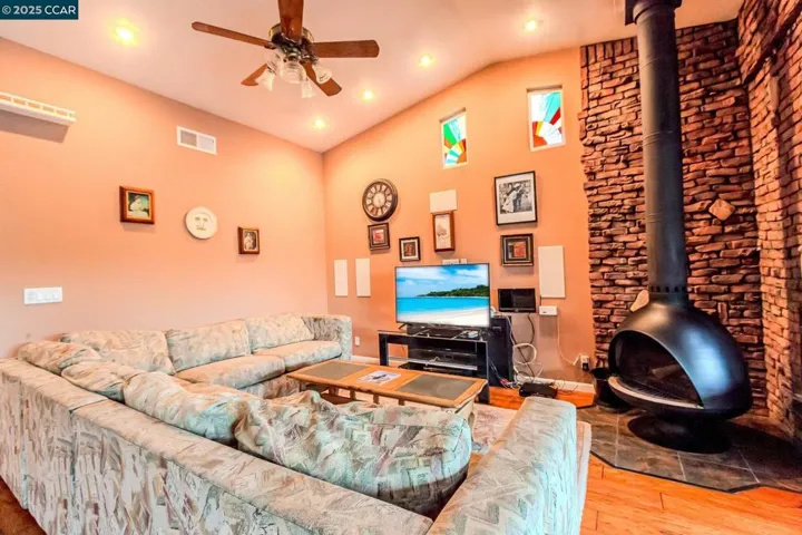 Family Room includes cozy stand alone wood burning stove.