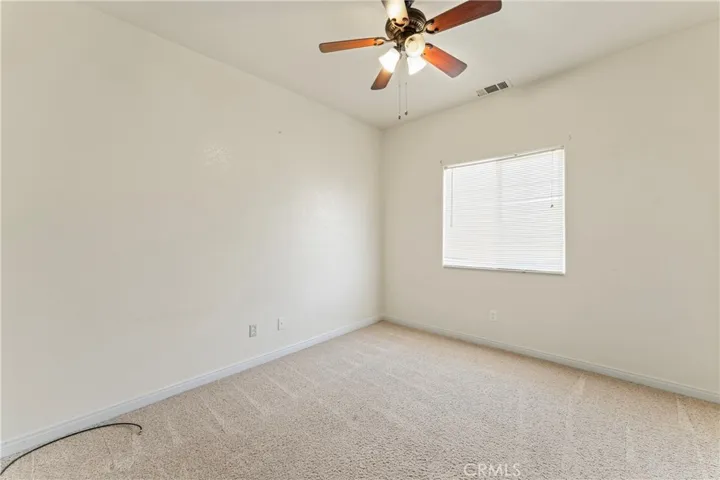 Bedroom #2 Window & Lighted Ceiling Fan