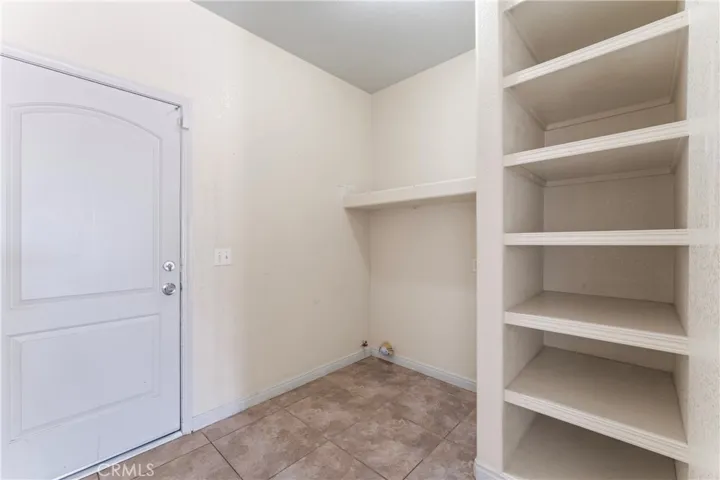 Laundry Area end of Hallway before Garage Door - Plenty of Storage (Size: 8'6" x 7'2")  Hallway is actually 3'6" x 9'10")