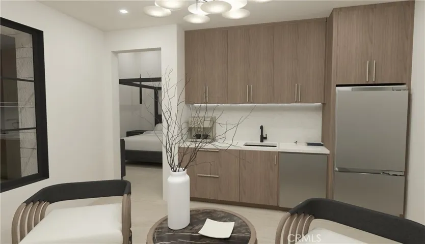 Architectural rendering – interior of detached guest casita with kitchenette and seating area.