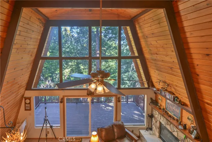 From Loft Looking to Living Room and Large Back Deck