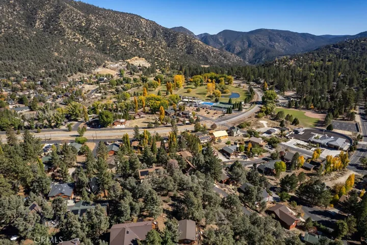 The lower center shows the open space above the houses, three undeveloped lots. The middle lot is 16524 Oakwood CT.