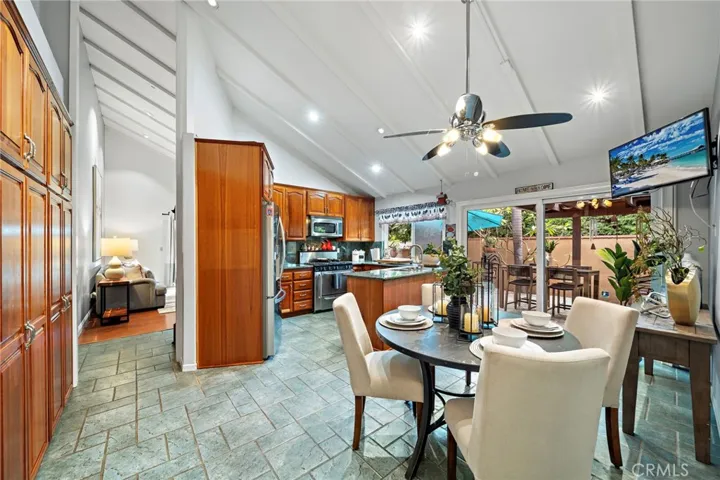 Dining/kitchen open concept with soaring ceilings
