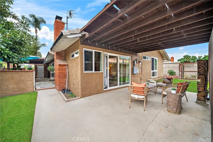 Wrap around backyard leads to another covered patio off living room