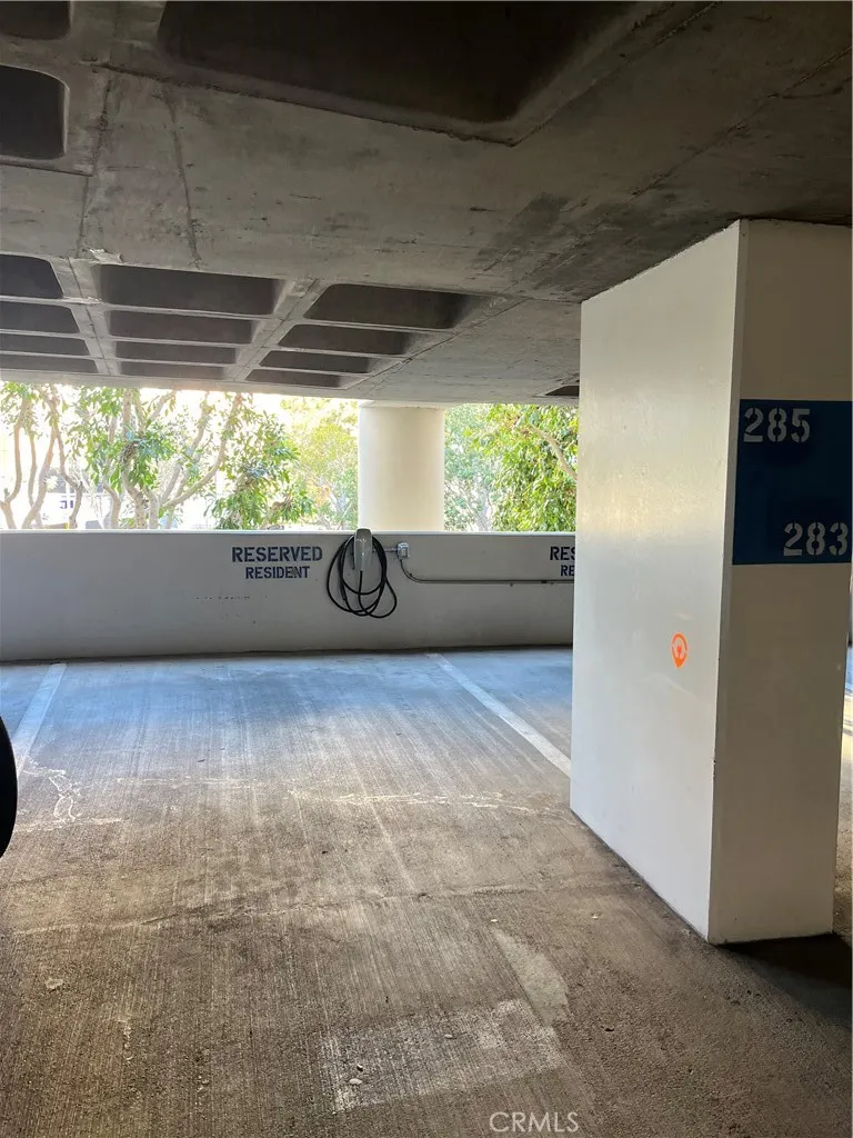 Parking space with exclusive 240V Tesla charger