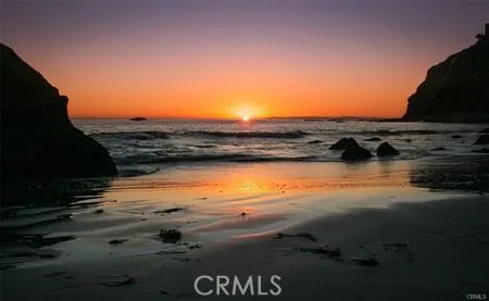 Enjoy sunset beach strolls just minutes from your home