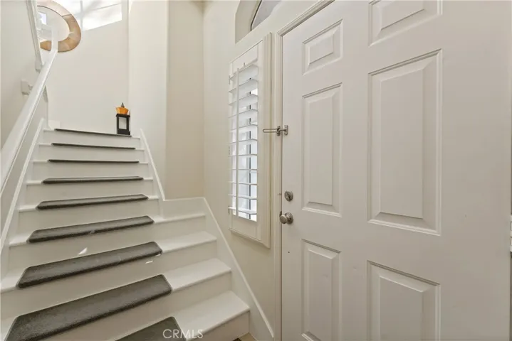 Front door & Stairs to the one-level unit