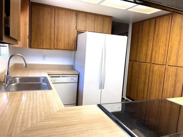 Cupboards lining the wall to the right.