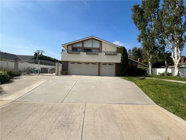 Large RV areas on the concrete and to the left of the 3 car garage
