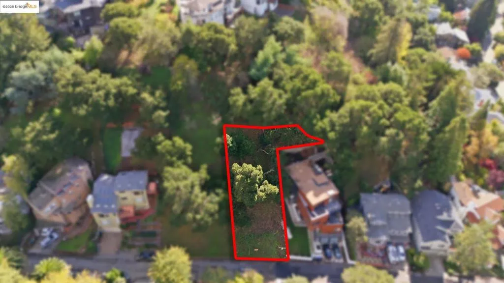 Aerial perspective of suburban area with property parcel outlined