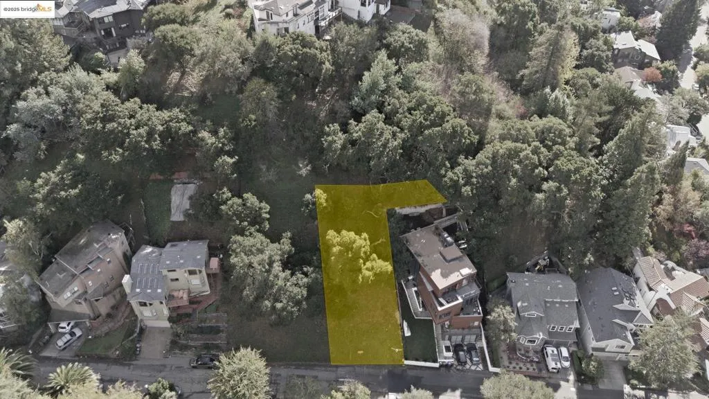 View of property location with nearby suburban area