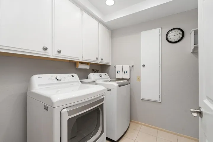 Laundry room with plenty of storage.
