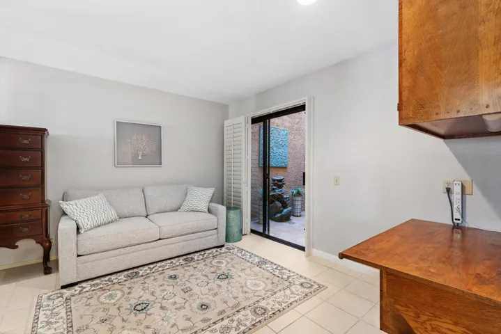 Third bedroom/den with atrium view.