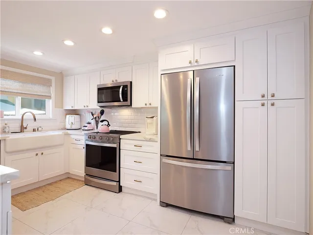 remodeled kitchen with stainless steel appliances