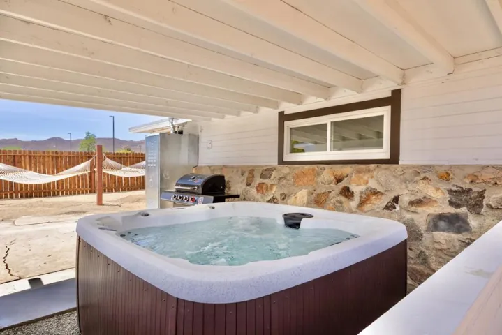 Hot tub looking at backyard