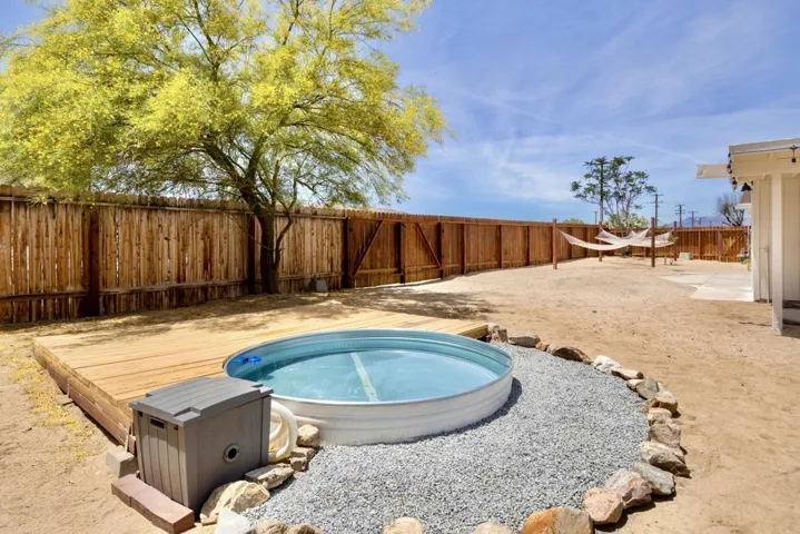 Cowboy pool looking towards side yard