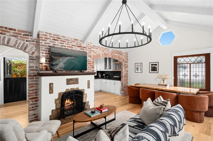 This fully renovated coastal cottage seamlessly blends historic character with modern comfort.