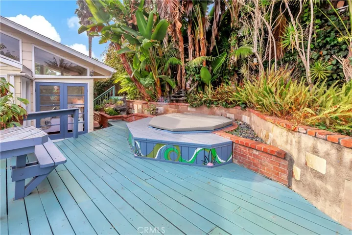 Backyard spa is and vegetation