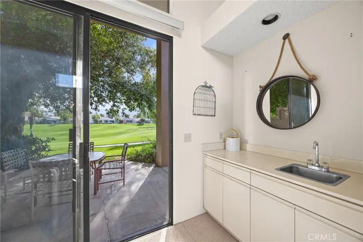 Wet bar and back patio fairway view