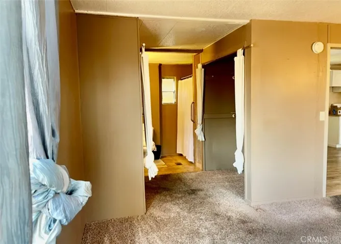 Master closets (2) and master entrance to master bath