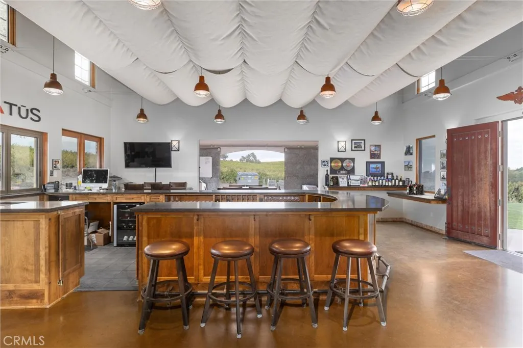 West side of tasting room looking out east side barn doors. through