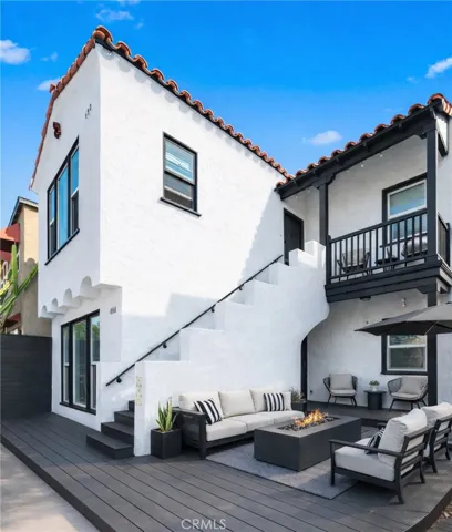 Virtually painted white.  Deck replaced flower bed.
