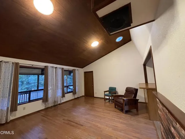 Living Room w-door to Attic Rooms