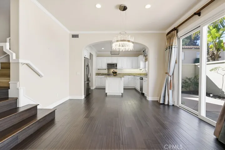 stairs on the side of the dining room area
