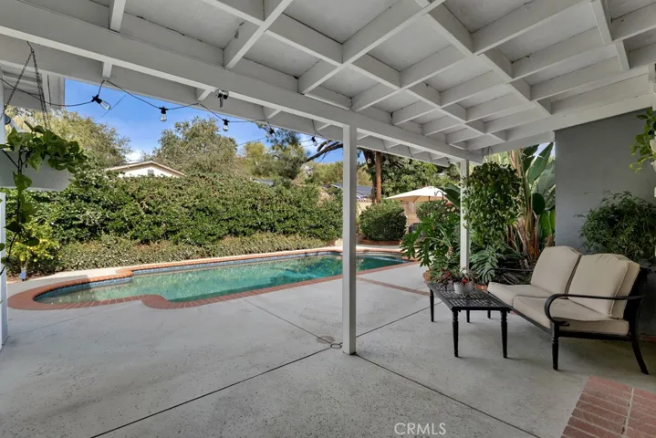 Entertainer’s Back Yard
Private paradise
Sparkling in-ground pool & spa
Resurfaced (2019)
Mini pebble-bottom
New heating and filter equipment (2019)
LED color changing lights 
Newer brick coping and tile
Covered patio
BBQ area on side yard
Mature fruit trees (lemon, orange, nectarine & pomegranate)
Bubblers and drip system on timer
Block wall fencing
