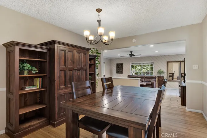 Dining room
Drop down lighting
Large double door closet offering additional storage Chair railing
Rich hardwood floors