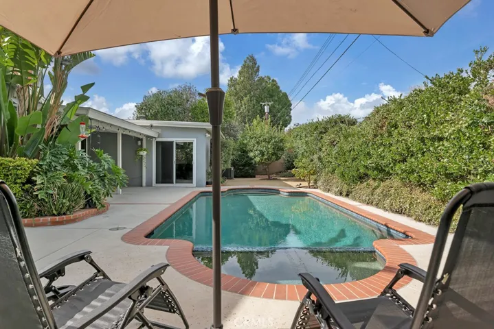 Entertainer’s Back Yard
Private paradise
Sparkling in-ground pool & spa
Resurfaced (2019)
Mini pebble-bottom
New heating and filter equipment (2019)
LED color changing lights 
Newer brick coping and tile
Covered patio
BBQ area on side yard
Mature fruit trees (lemon, orange, nectarine & pomegranate)
Bubblers and drip system on timer
Block wall fencing